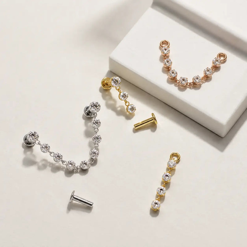 Lyra connector flat back studs disassembled in white gold, yellow gold, and rose gold showing posts and chain