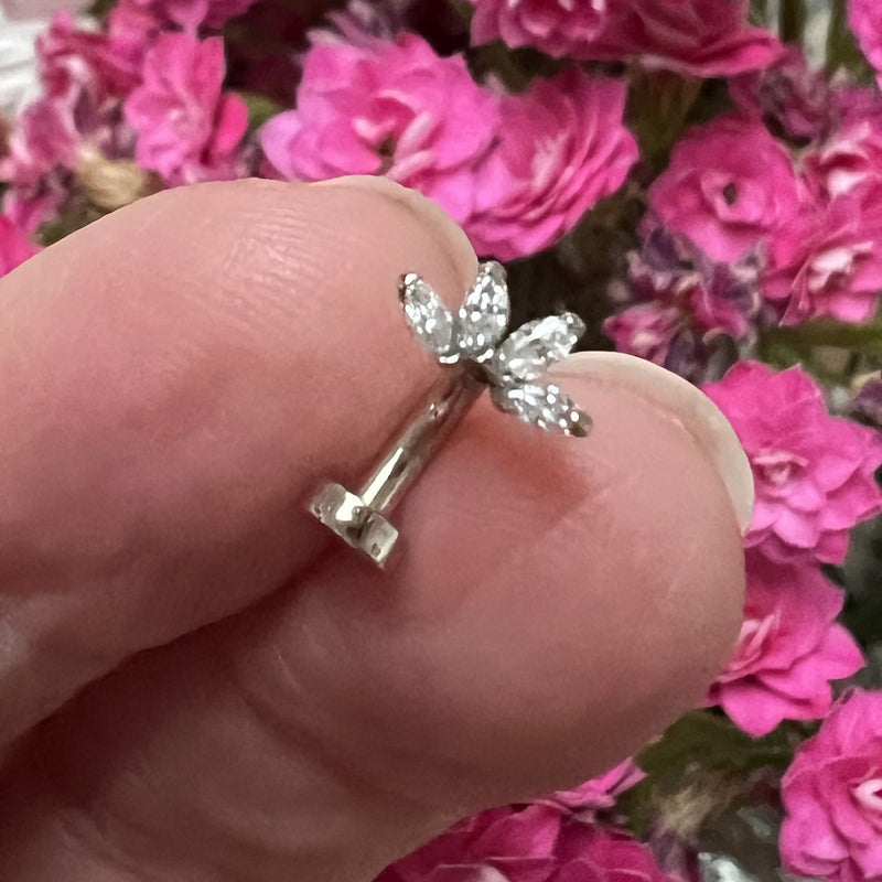 14k white gold marquise fan floating navel ring held in fingers for size reference