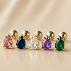Five pear-cut gemstone flat back studs in 14k gold showing pink, blue, clear, purple, and green color options