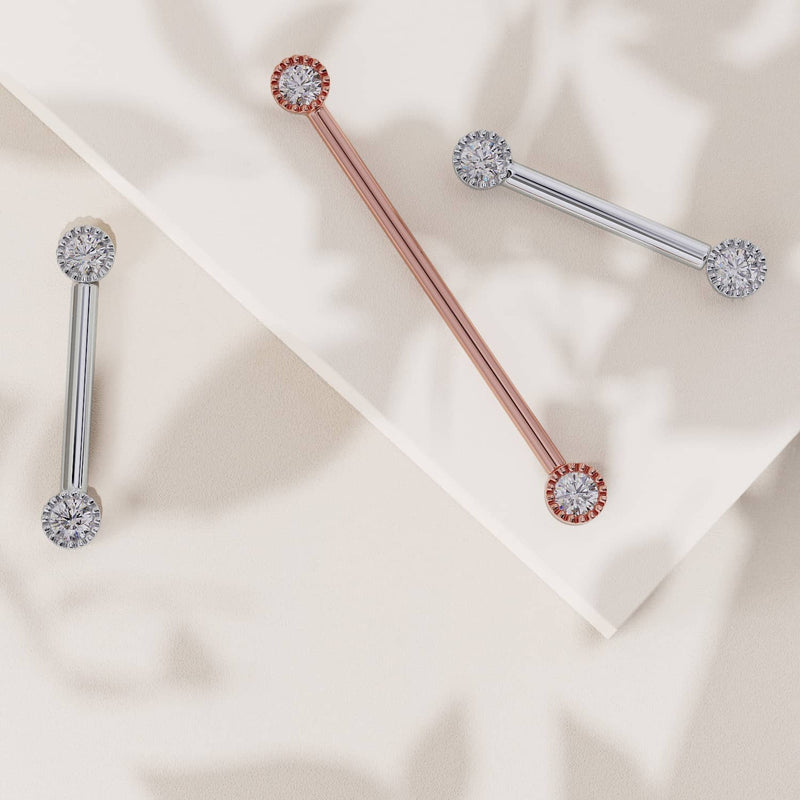 14K rose gold and white gold diamond perlage nipple barbells shown together, comparing metal color options