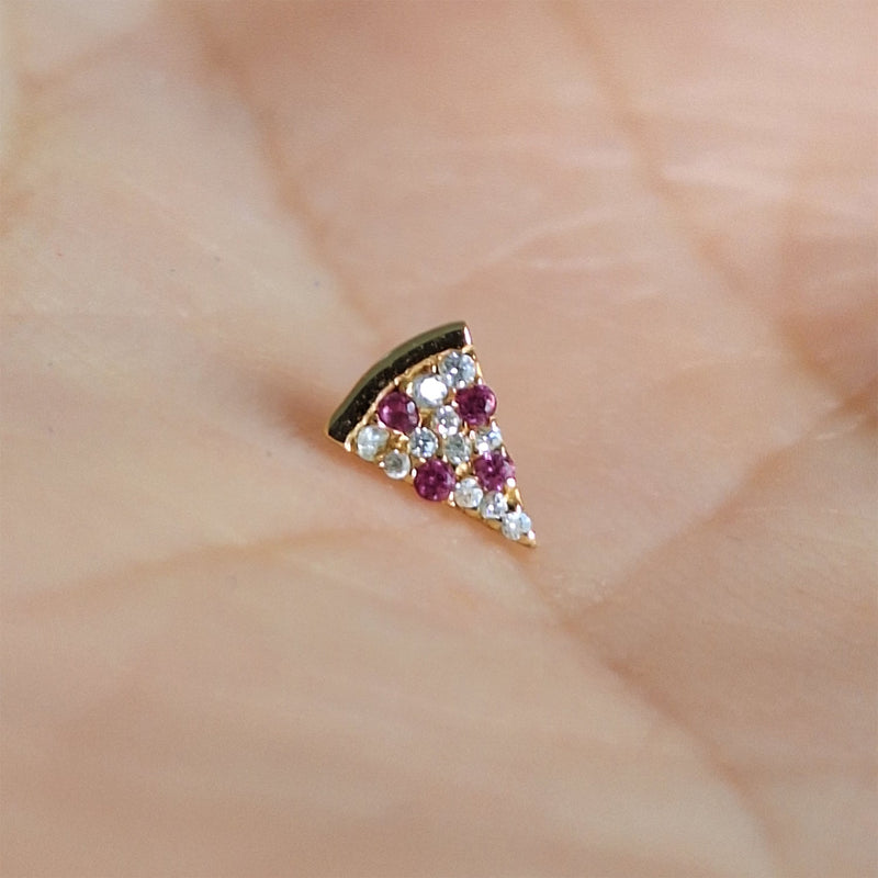 14K gold pizza slice labret top held on fingertip to show tiny actual size and scale