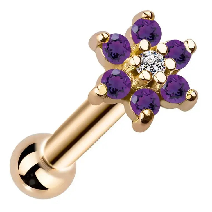 A 14k gold cartilage earring featuring a flower-shaped top set with five round purple gemstones and a central clear cubic zirconia, shown on a plain white background.