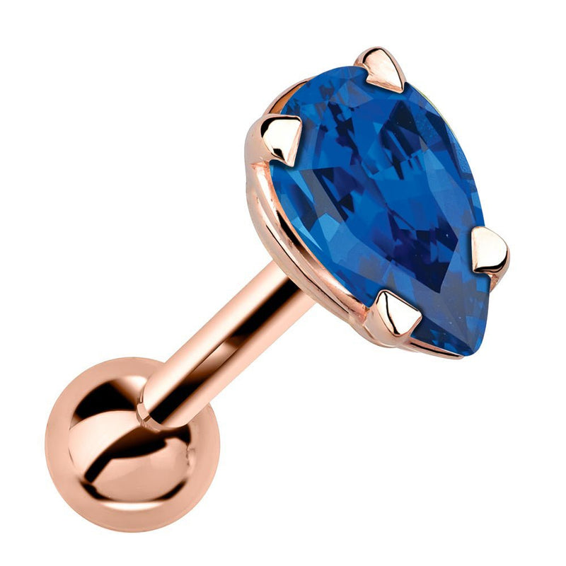 14k rose gold cartilage stud with pear-cut blue sapphire gemstone in 4-prong setting, angled view