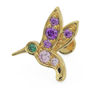 14K yellow gold hummingbird flat back labret with amethyst, pink sapphire, and emerald gems, angled view