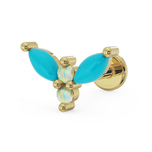 14K yellow gold firefly flat back labret with marquise turquoise wings and white opal body, angled view