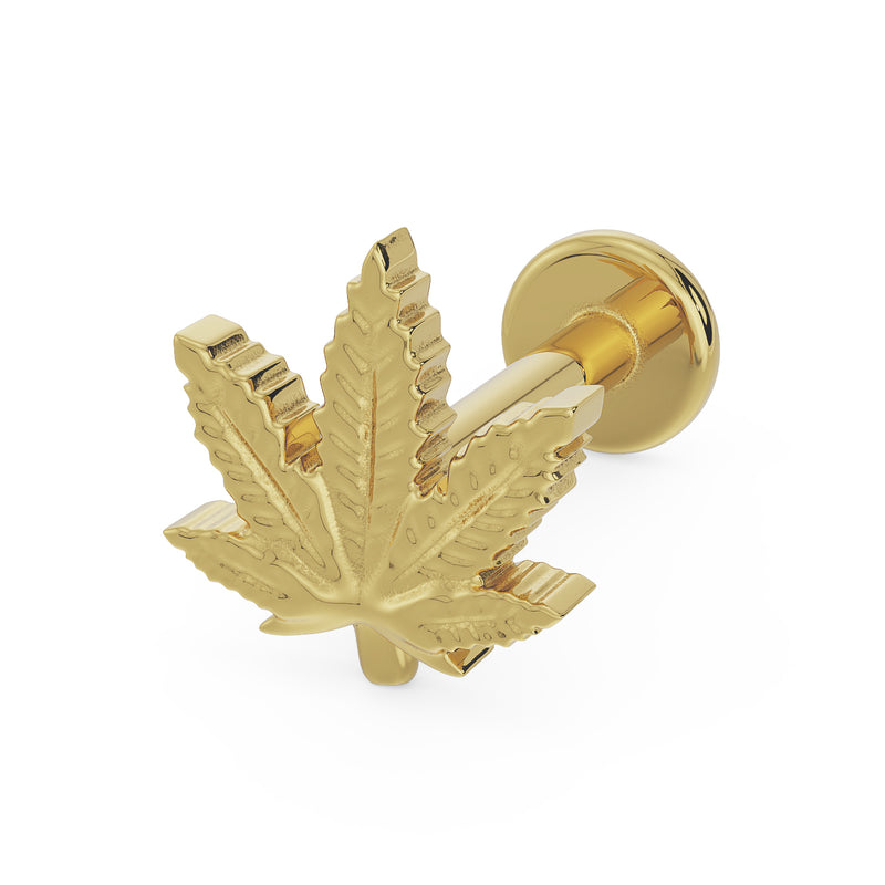14K yellow gold marijuana leaf flat back labret, angled view showing engraved leaf detail and flat disc back