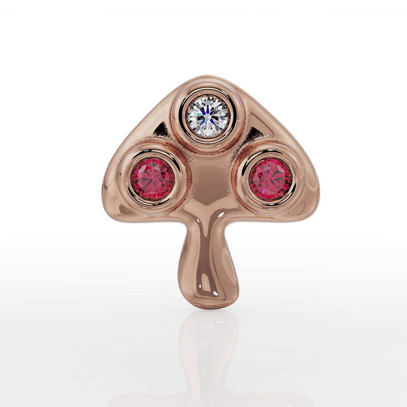 14K rose gold mushroom flat back earring, front view highlighting diamond center and two ruby bezels