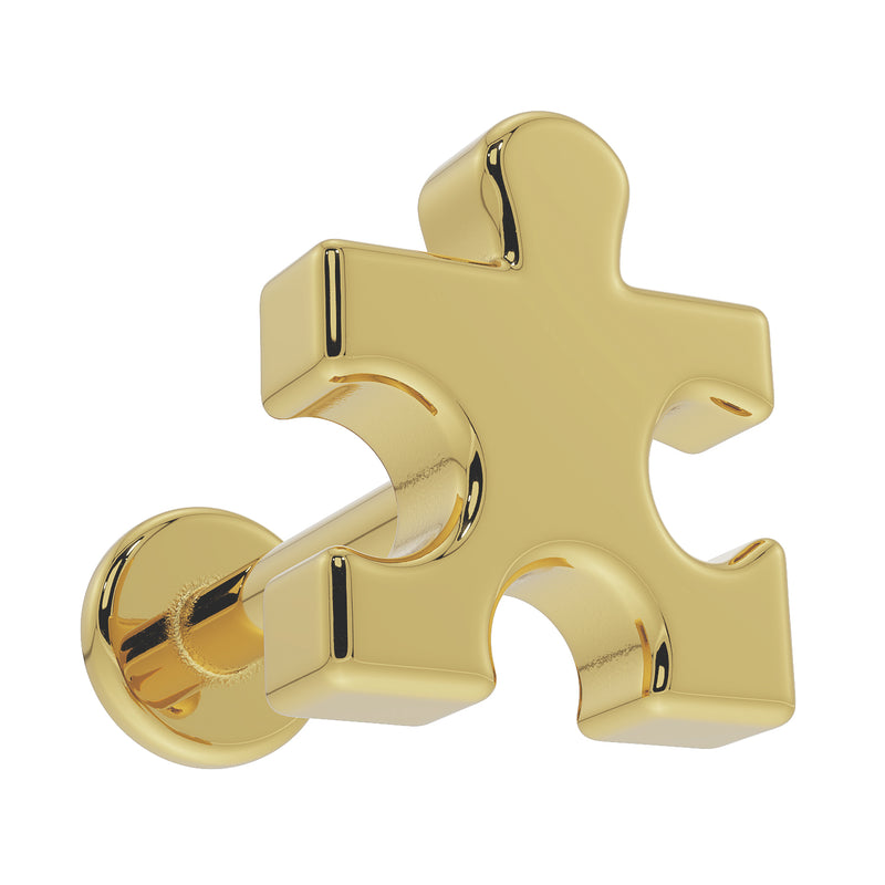 14K yellow gold puzzle piece flat back earring viewed from below at an angle, highlighting 3D depth of charm
