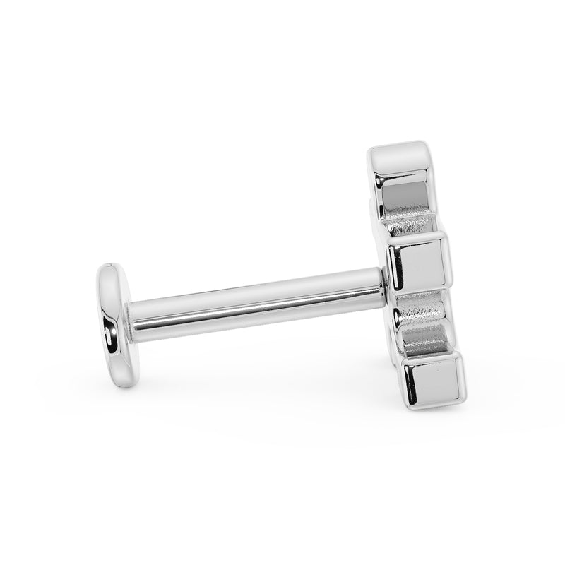 Side profile of 14K white gold puzzle piece flat back earring showing post length and flat disc back