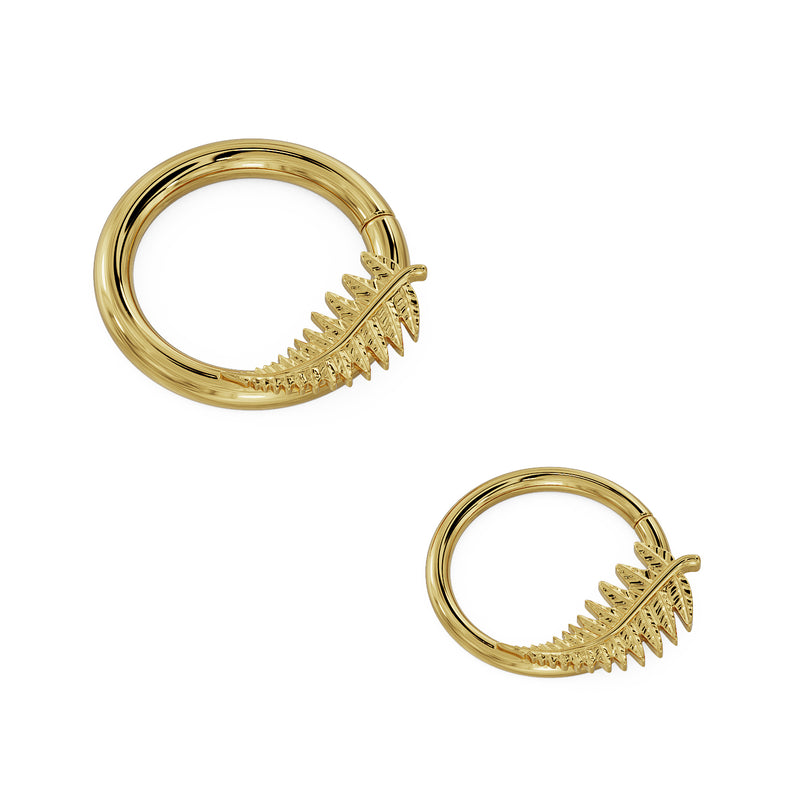 Two 14K yellow gold fern leaf seam rings side by side showing small and large diameter size options