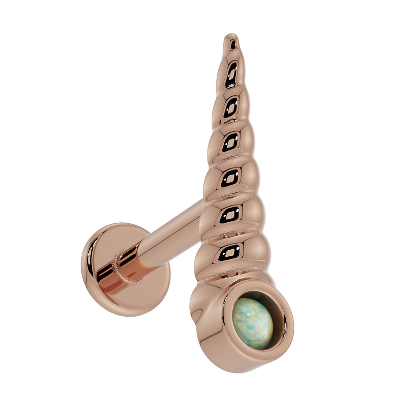 14K rose gold unicorn horn labret angled view showing opal bezel base, ridged horn, and flat disc