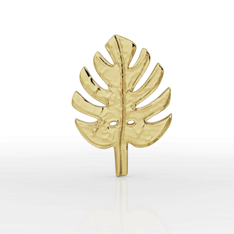 Close-up front view of 14K yellow gold monstera leaf earring top showing polished hammered surface and cutouts