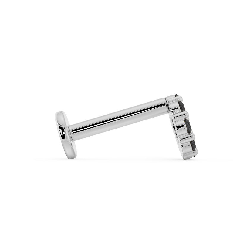 Side profile of 14K white gold black diamond halo labret showing flat back post length and earring depth
