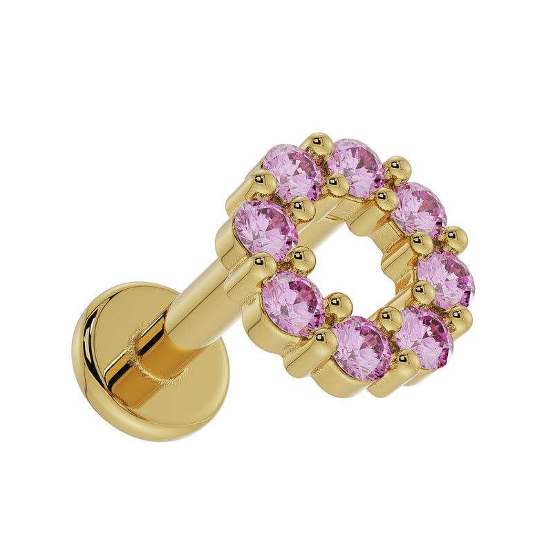 Close angled view of 14K yellow gold pink sapphire halo labret highlighting sapphire setting depth