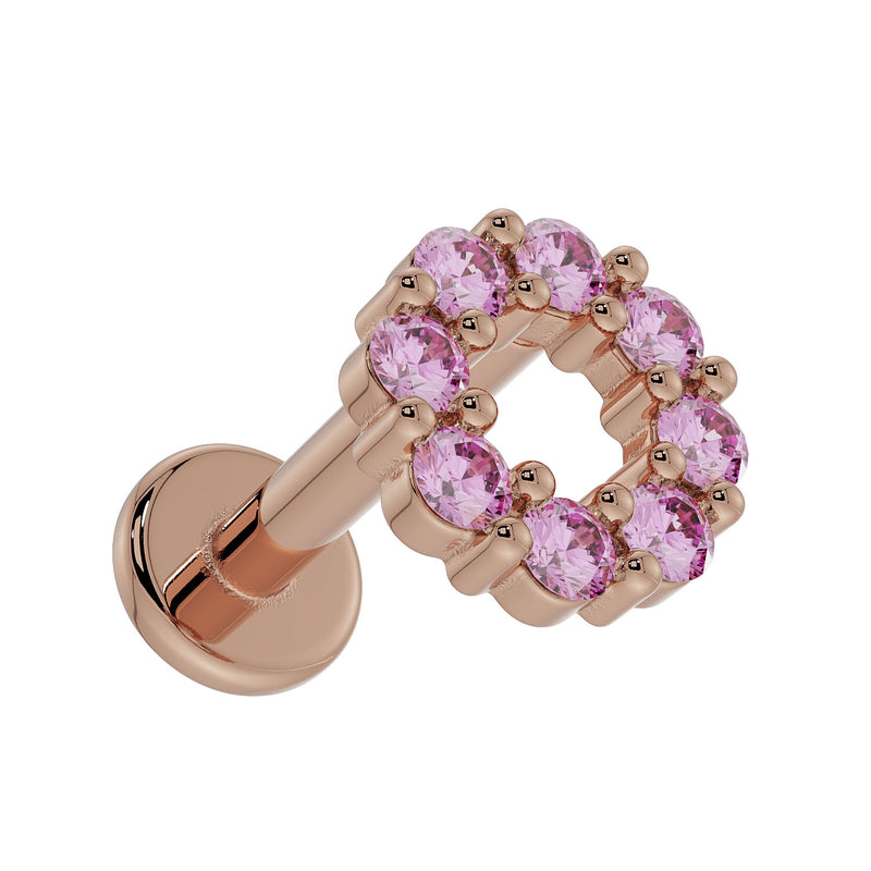 Close angled view of 14K rose gold pink sapphire halo labret highlighting sapphire setting depth