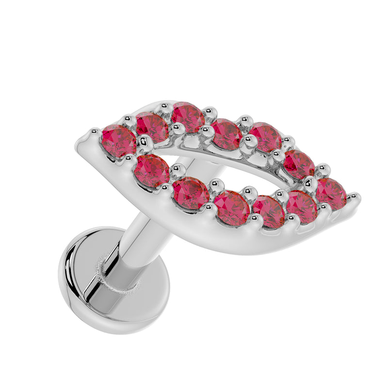 14K white gold lips flat back labret showing garnet pave detail and flat disc back, tilted front view