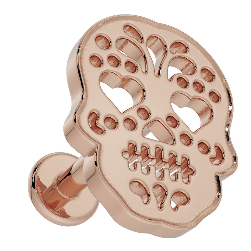 Reverse side of 14K rose gold Dia de los Muertos skull labret showing ball end and barbell post
