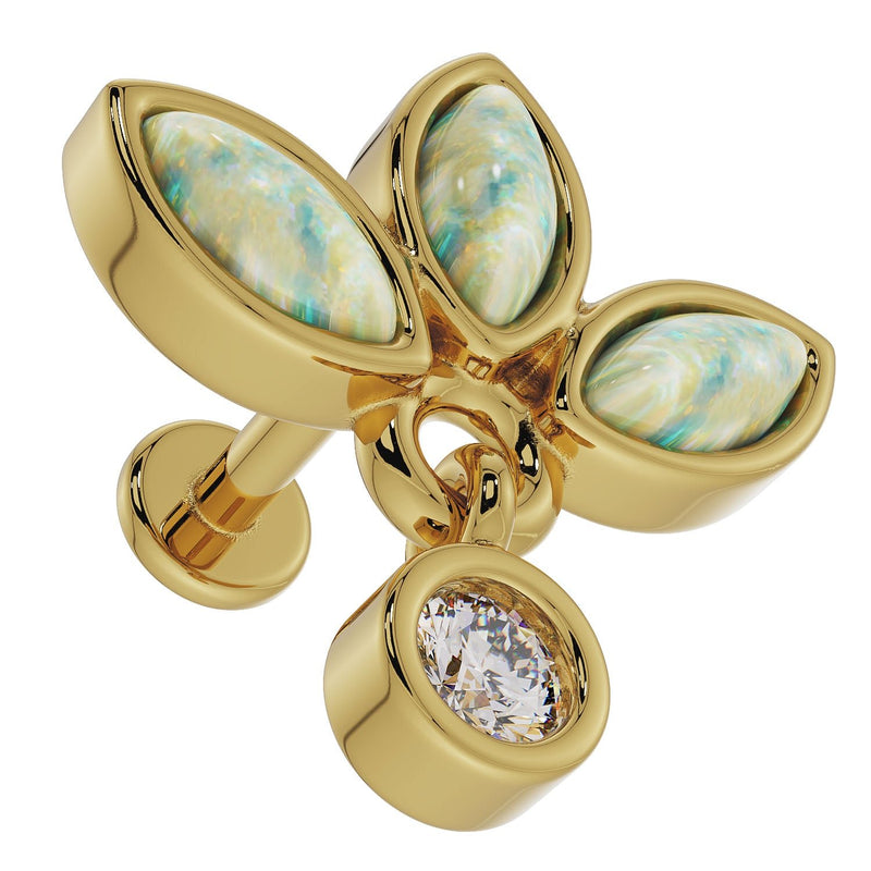 Close-up overhead view of 14K yellow gold opal wildflower labret showing iridescent marquise opal play-of-color