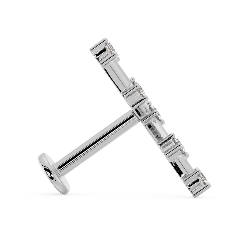 Side profile of Taurus constellation flat back labret showing post length and flat disc backing