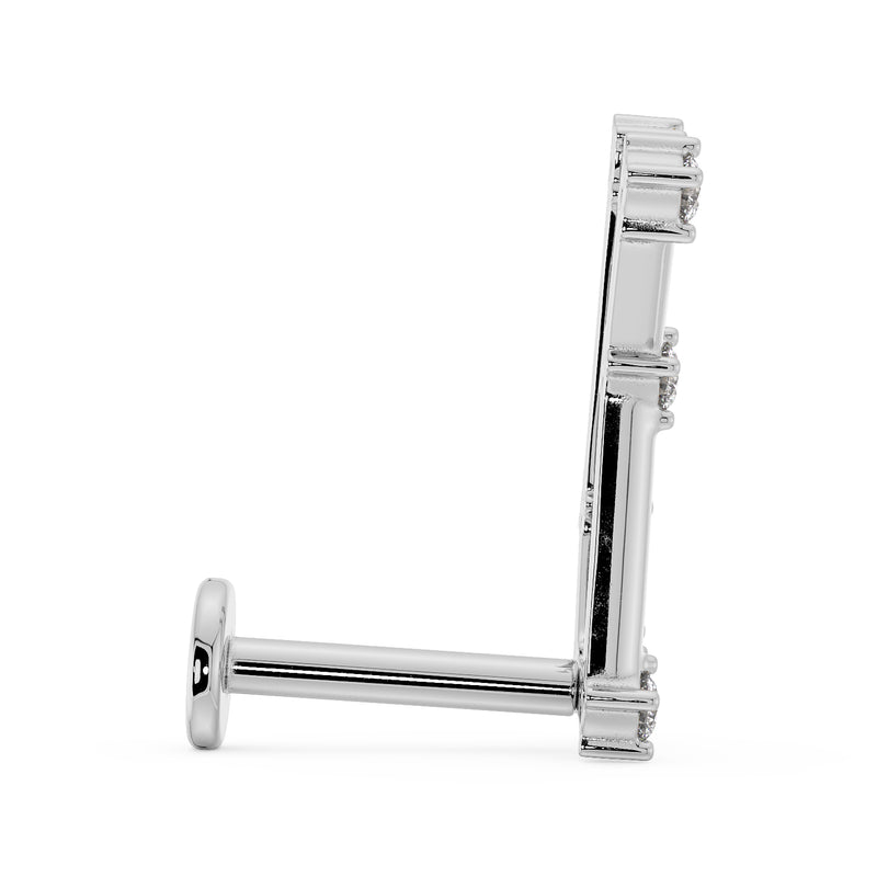 Side profile of 14k white gold Gemini constellation labret showing flat back post and disc backing