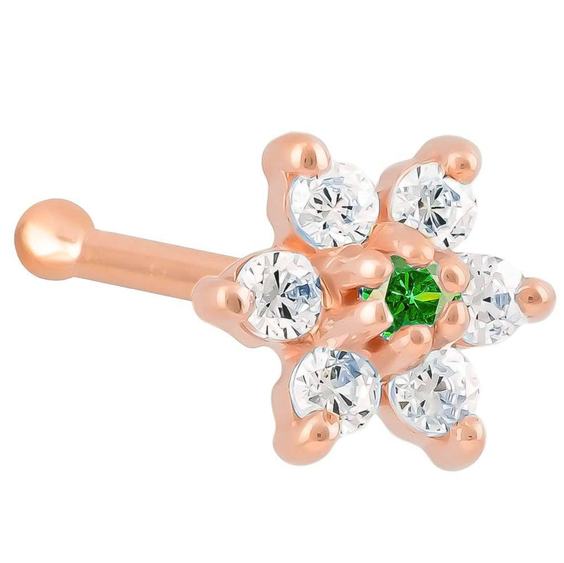 14K rose gold flower nose bone with dark green emerald CZ center and clear CZ petals, angled view