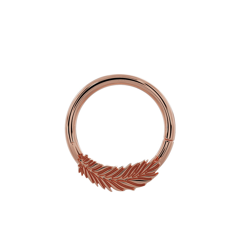 14K rose gold feather seam ring tilted forward, showing full feather detail along lower arc