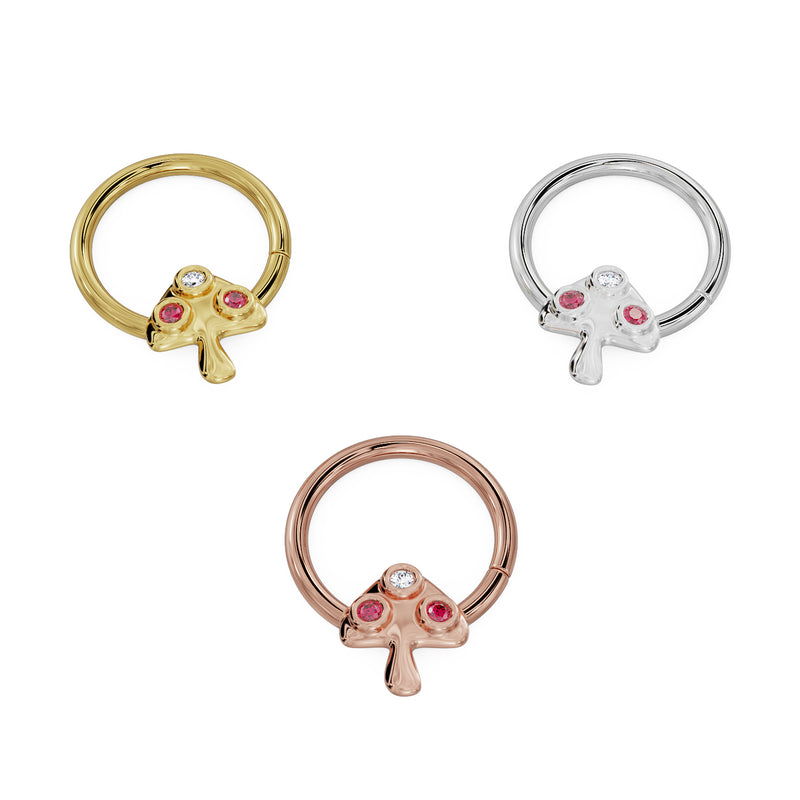 Angled comparison of mushroom seamless ring in 14K yellow, white, and rose gold with ruby and diamond