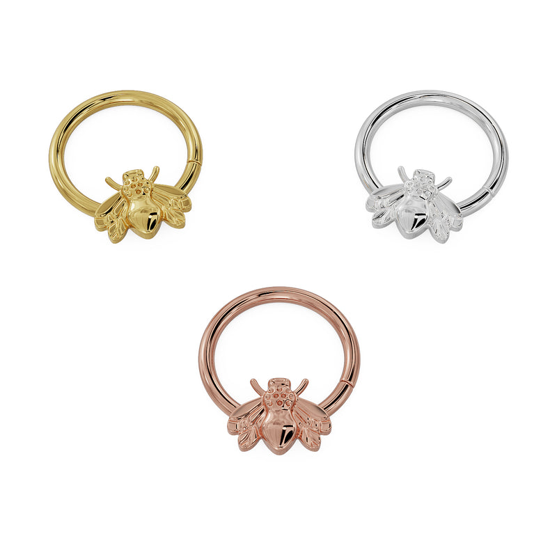 Bee seam ring hoop in yellow, white, and rose gold shown from a slightly angled perspective