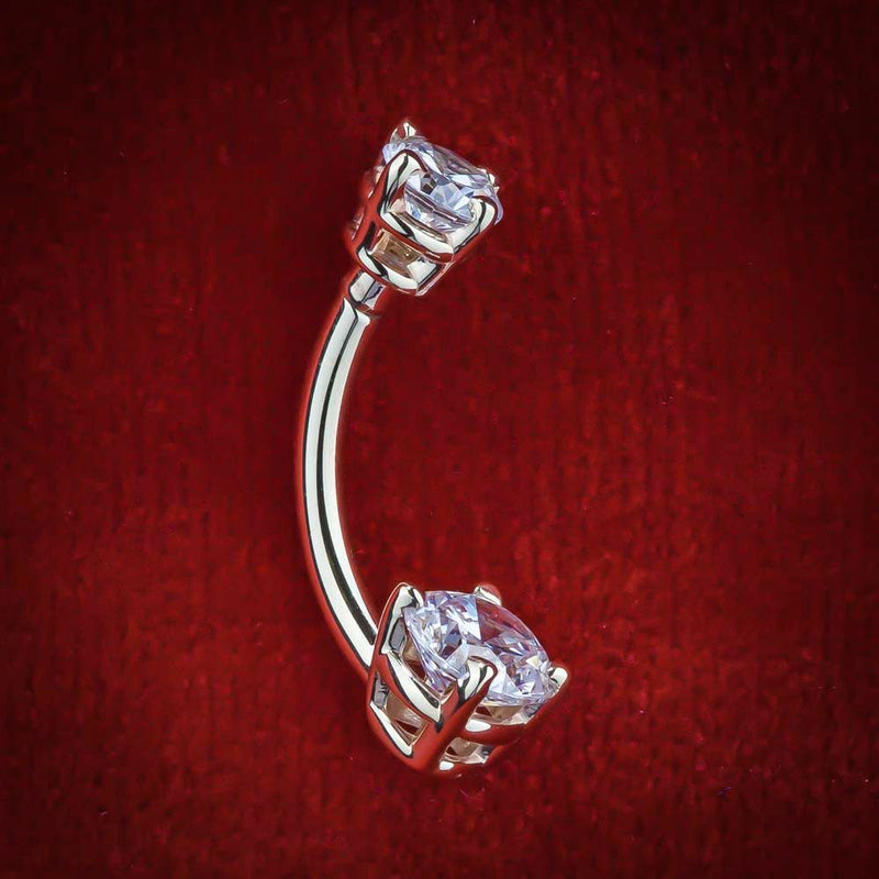 14k white gold double CZ belly ring with clear stones, side profile on red velvet background