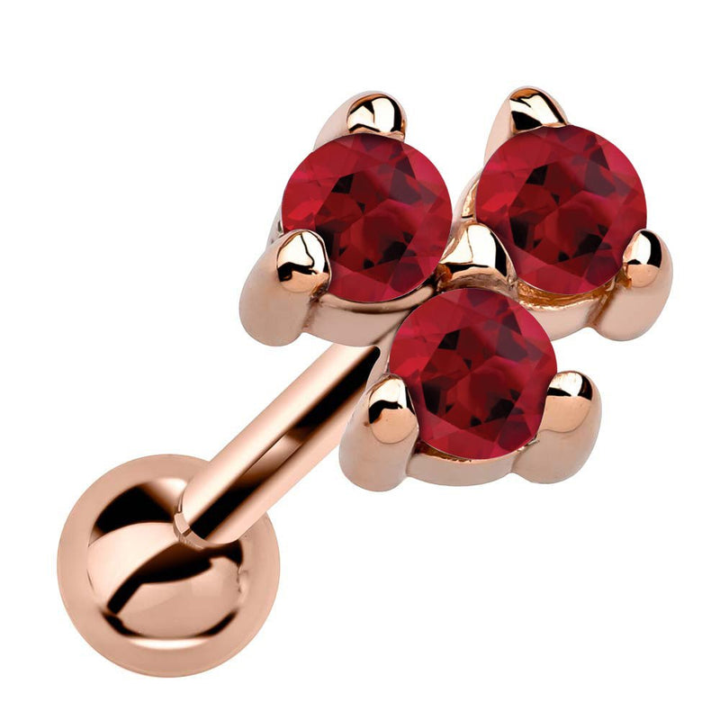 14k rose gold triple ruby cartilage stud with three vivid red stones in prong cluster setting, angled view