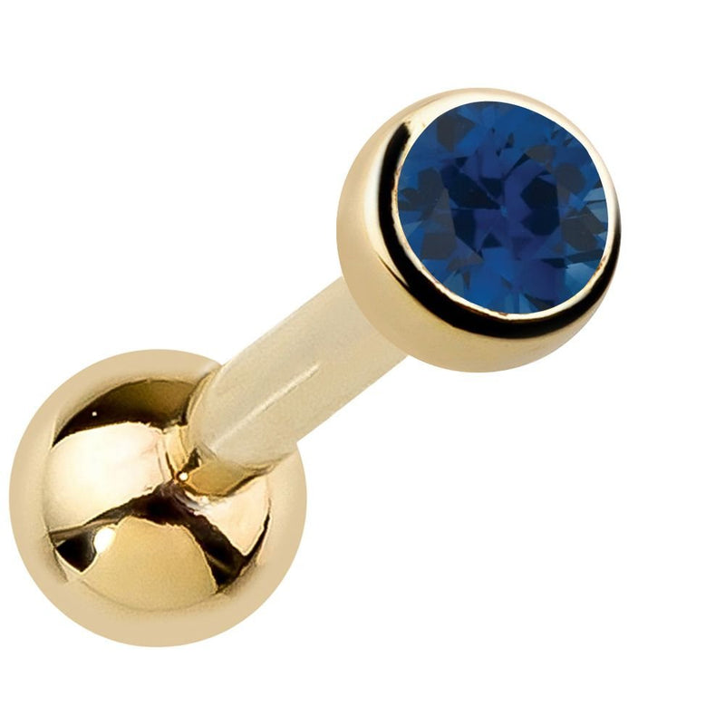 14k yellow gold bezel-set sapphire cartilage stud with deep blue genuine gemstone, angled view