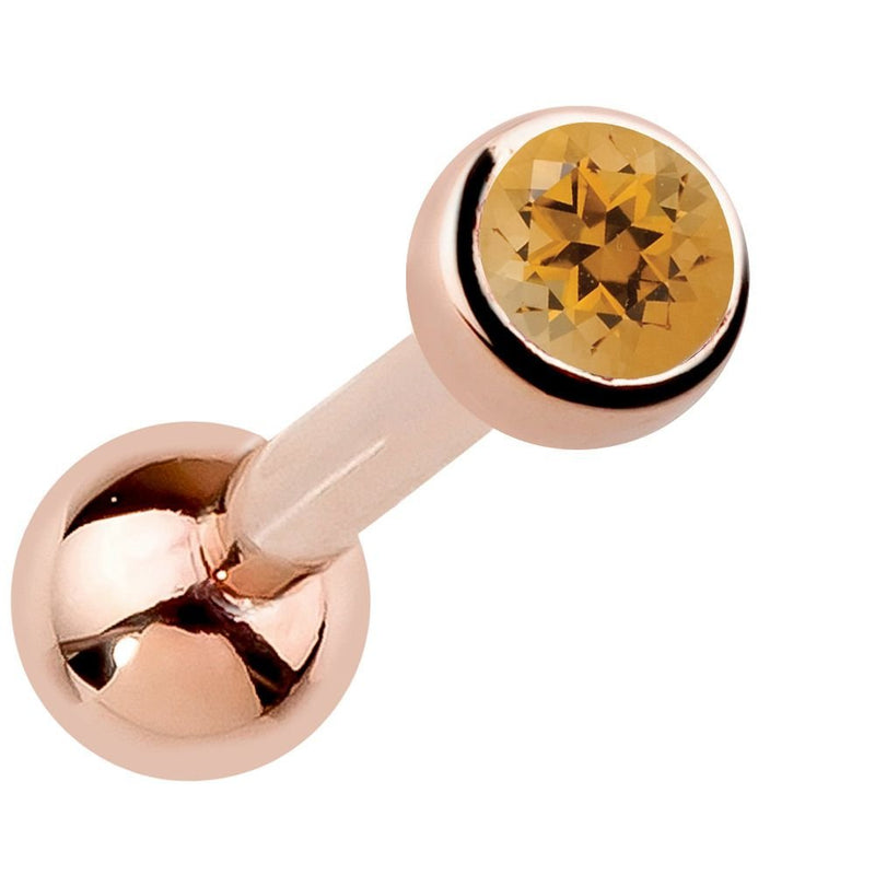 14k rose gold bezel-set citrine cartilage earring with golden-amber genuine gemstone, angled view