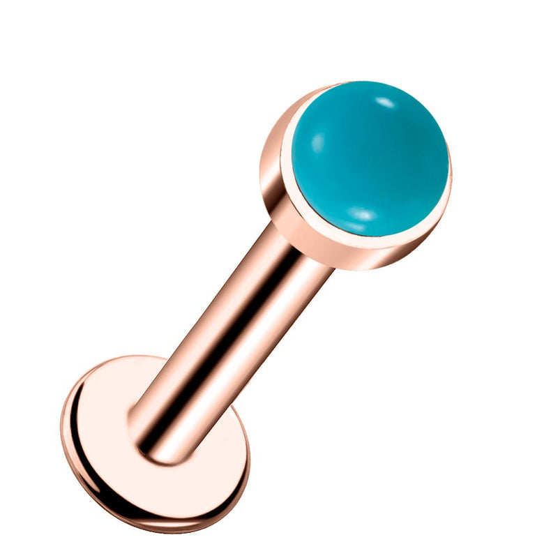 14k rose gold flat back labret with 2mm turquoise cabochon in bezel setting, angled side view