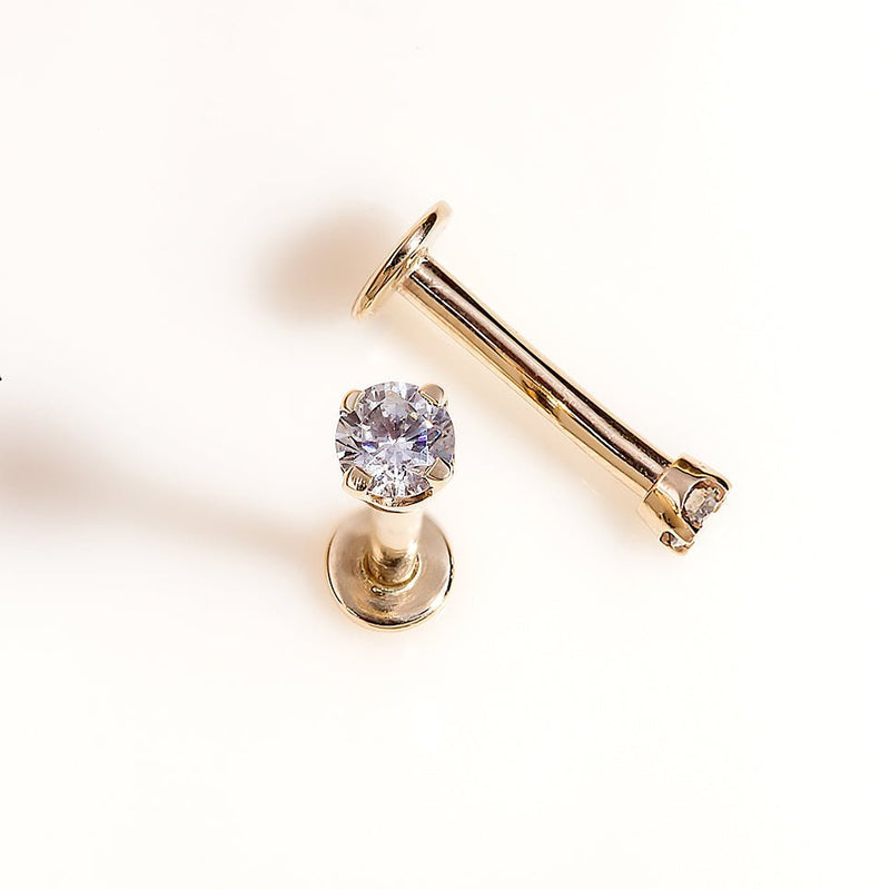 14k gold 2mm diamond flat back labret stud shown disassembled with post and top separated