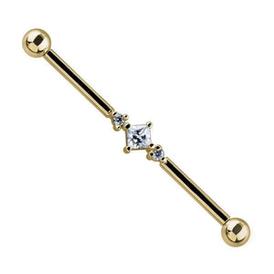 14K yellow gold industrial barbell with princess cut CZ center and two prong-set CZ side stones, front view