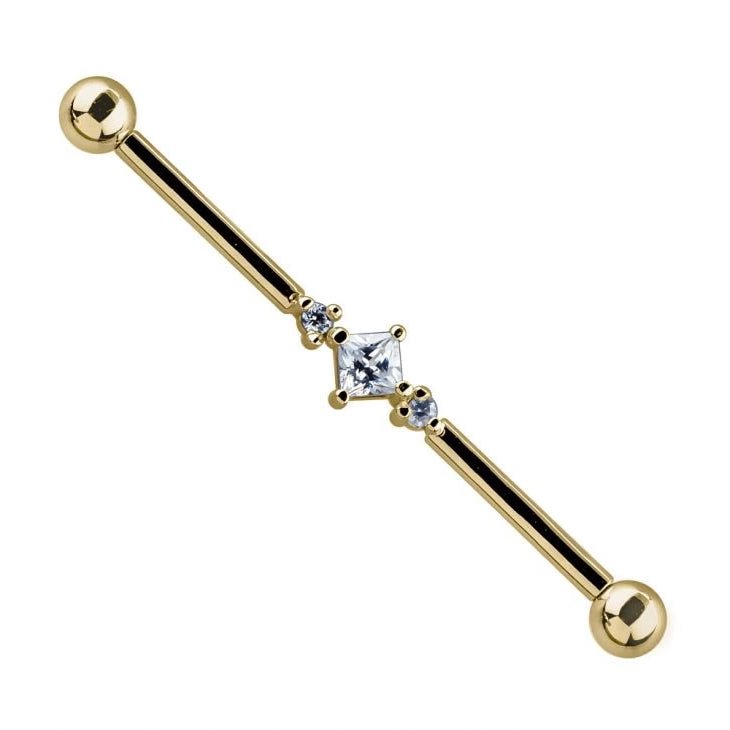 14K yellow gold industrial barbell with princess cut CZ center and two prong-set CZ side stones, front view