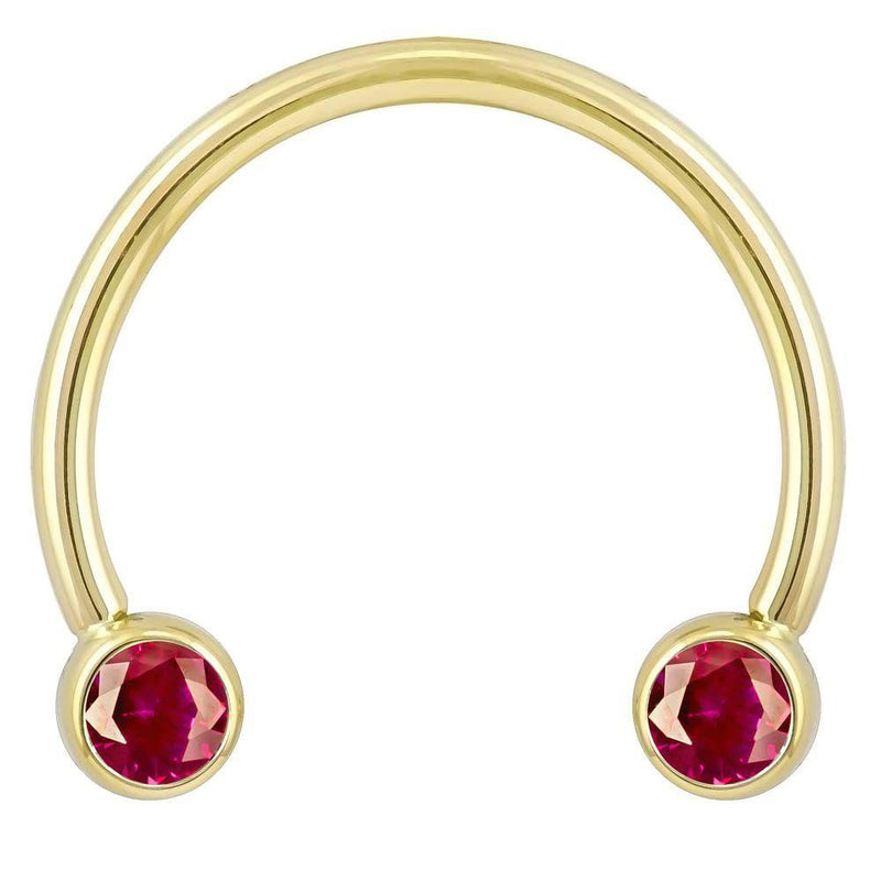 14k yellow gold circular barbell with red CZ bezel ends, smaller diameter front view