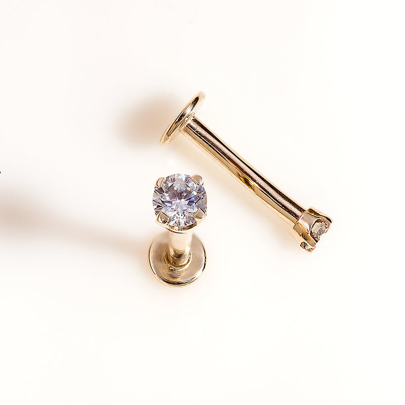 14k gold 3mm CZ flat back labret studs shown assembled and disassembled, displaying post and gem top
