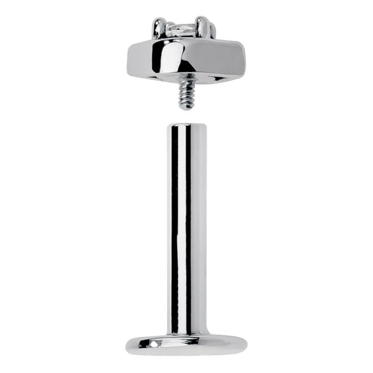 Disassembled internally threaded labret post in silver showing flat back disc, barbell, and eye-shaped end