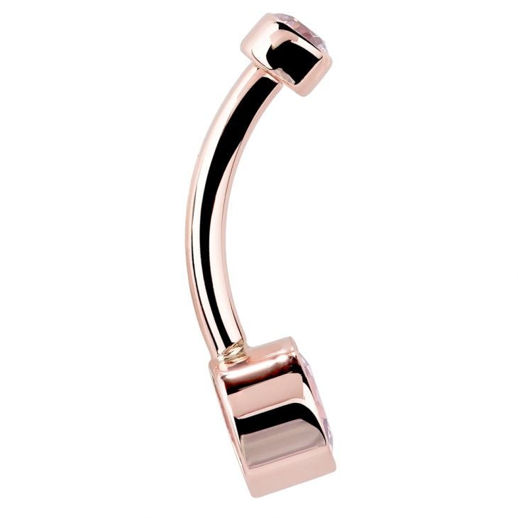 Reverse profile of 14K rose gold Petite Bella belly ring showing polished barbell curve and bezel backs