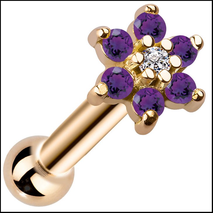 14k yellow gold flower cluster cartilage stud with purple CZ petals and clear center stone, angled view
