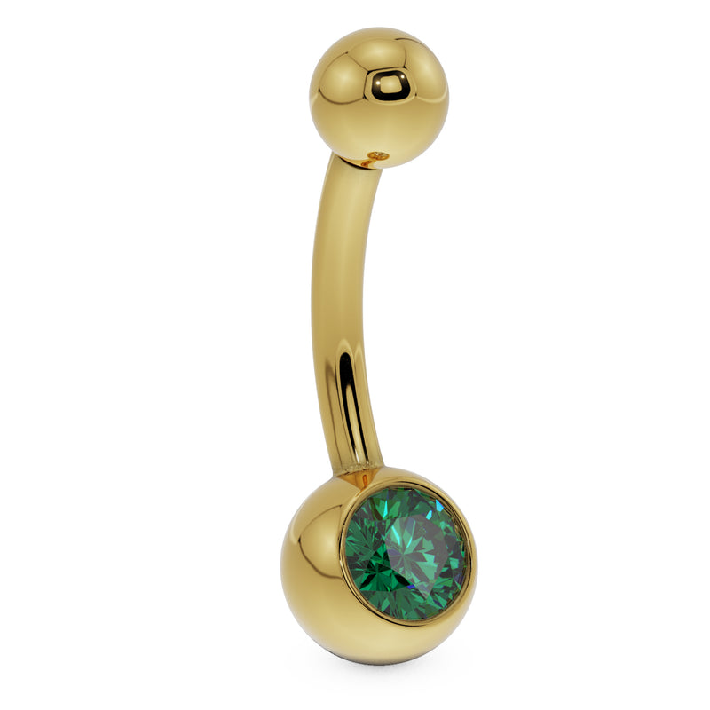 Side profile of 14K yellow gold belly button ring with green CZ bezel ball