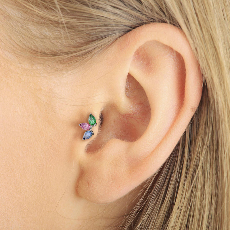 Triple pear-cut gemstone flat back stud worn in a rook piercing on a model's ear