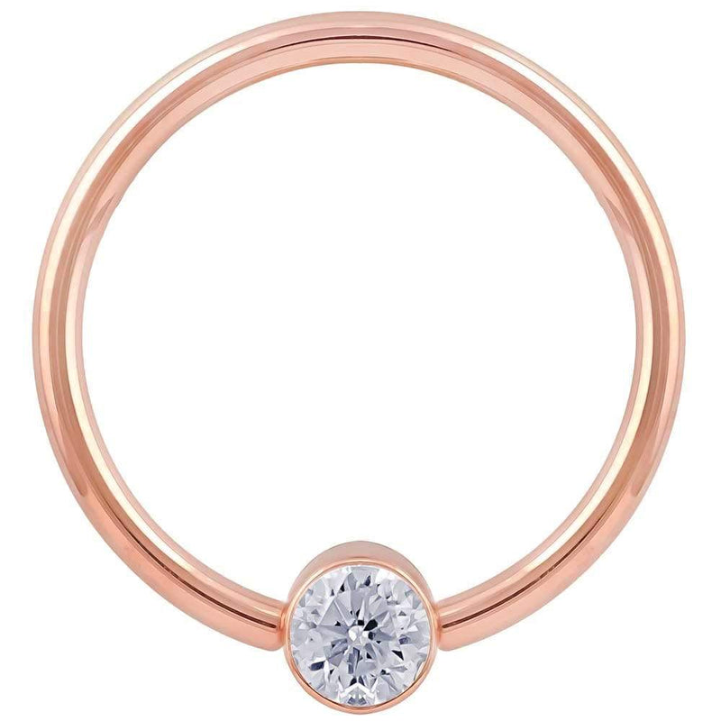 14k rose gold CZ bezel fixed bead ring, closer crop emphasizing the bezel-set cubic zirconia detail