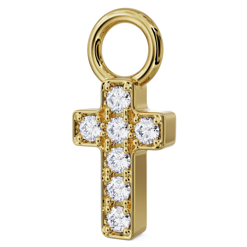 Angled side view of 14k yellow gold diamond cross charm showing depth and prong-set diamond details