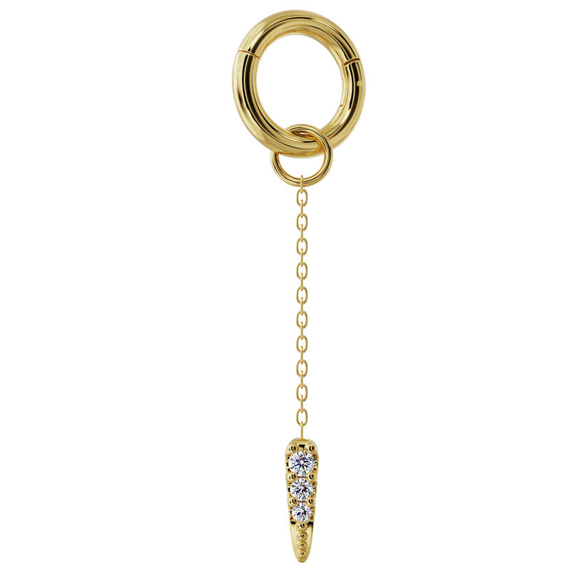 14K yellow gold diamond spike chain accessory clipped onto a segment ring, showing attachment method