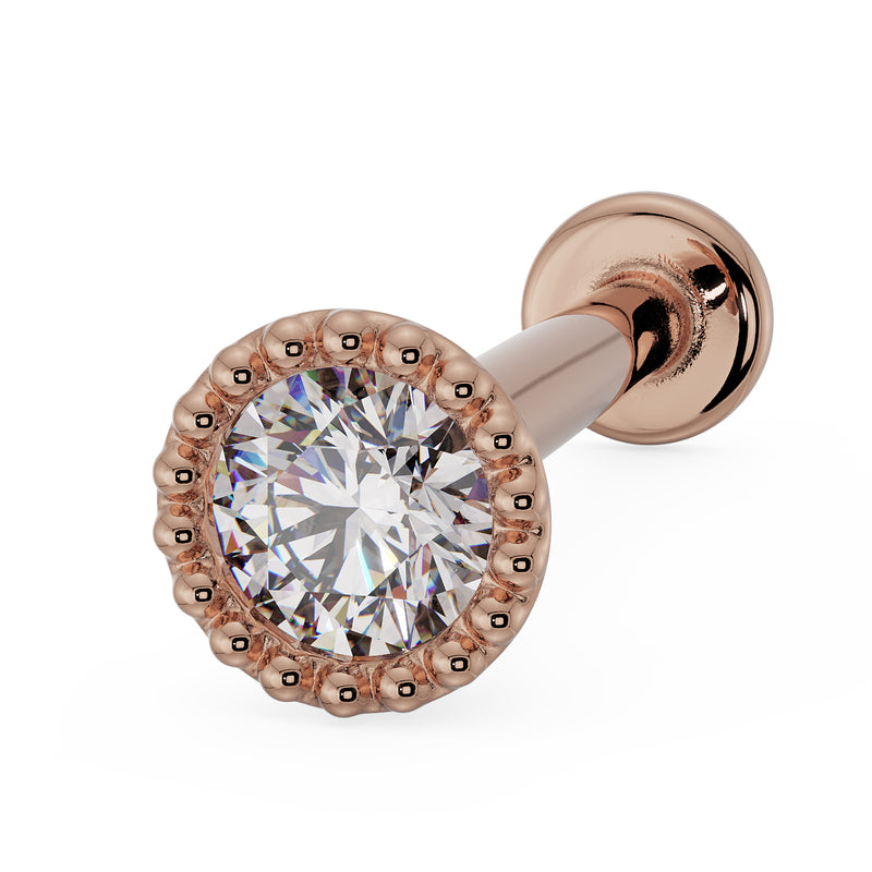 14k rose gold diamond milgrain flat back labret stud, angled view highlighting warm gold beaded setting