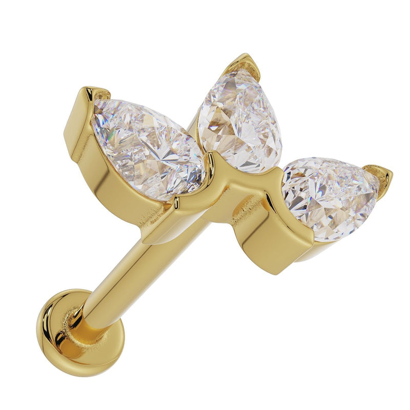 14k yellow gold pear CZ lotus labret stud from low angle highlighting sparkle and gold setting