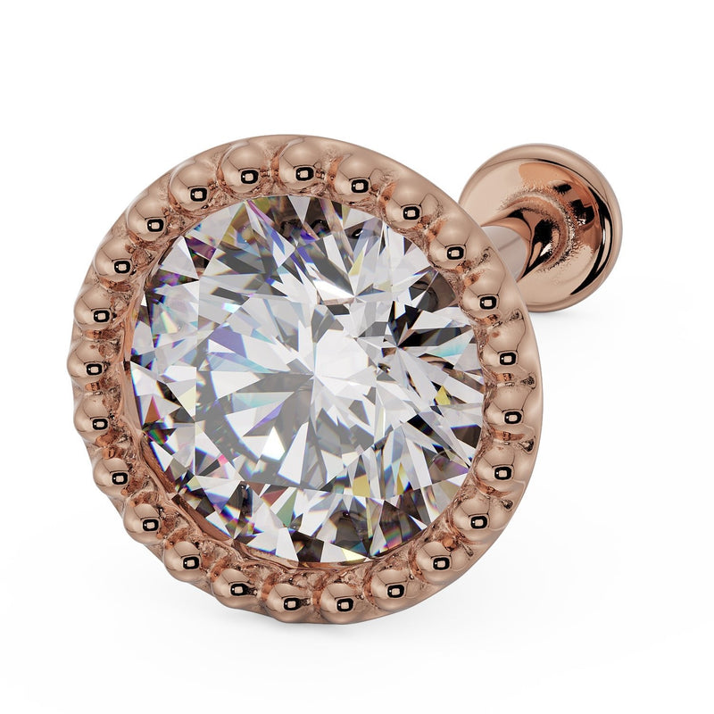 14k rose gold 4mm CZ milgrain flat back labret stud, angled front view with warm-toned beaded setting