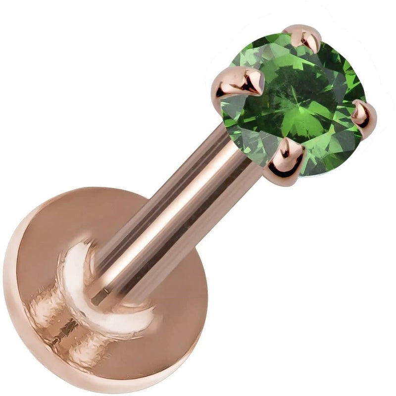 2mm emerald prong-set flat back labret in 14K rose gold, highlighting warm pink tone against green stone